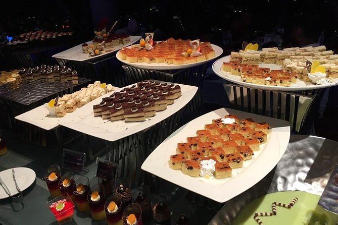 Dining at ORBIT Revolving Restaurant KL Tower with Transfers - The revolving experience: how the rotation affects your night
