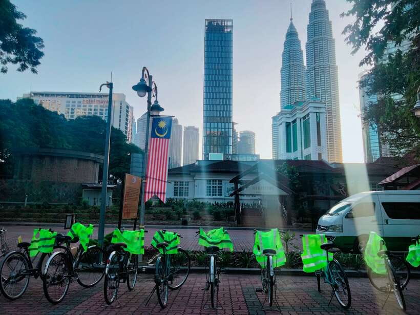 Hidden Kuala Lumpur: 4-Hour Bike Tour - Sultan Abdul Samad and Petaling Street, where the day turns into a food-and-culture route