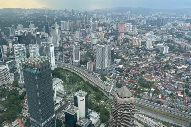 Kuala Lumpur City Tour with Petronas Twin Tower Admission Ticket - National Palace (Istana Negara) and National Monument: respectful, low-pressure stops
