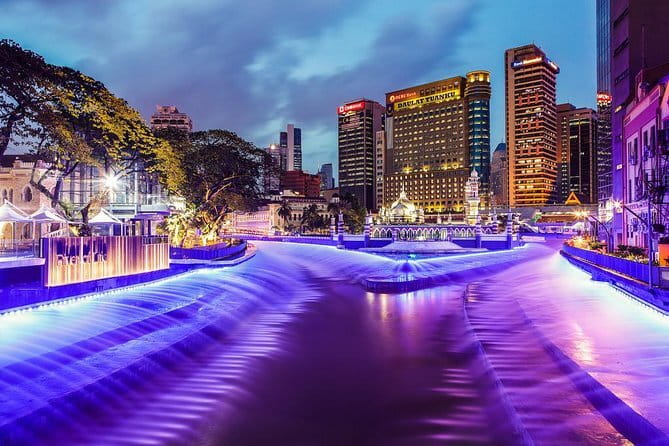 Kuala Lumpur: Nightlife Walking Tour with Local Guide - Designer storefronts and local shops, what you see and why it matters