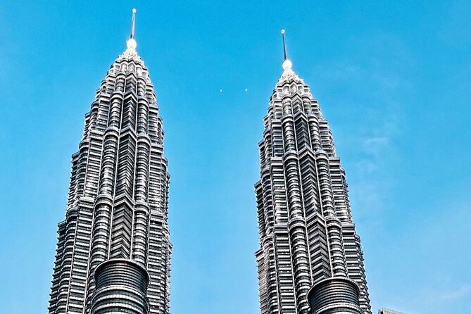 Kuala Lumpur Sunset Evening Cycling Tour - Jalan Salleh: Traditional Malay Stilt Houses and a 1900-Era Enclave