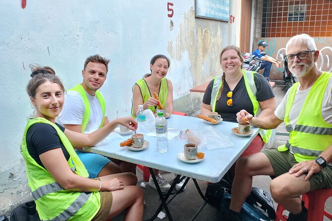 Kuala Lumpur Sunset Evening Cycling Tour - Petaling Street Market to Kwai Chai Hong: Alley Lights, Murals, and Motion