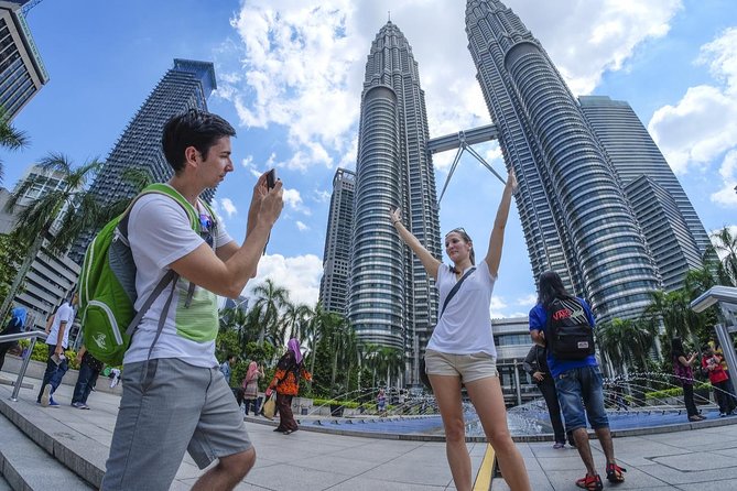 Petronas Twin Tower Tickets & Top Ten Wonder of Kuala Lumpur Tour - Batu Caves 1 hour: limestone temples, steps, and photo timing