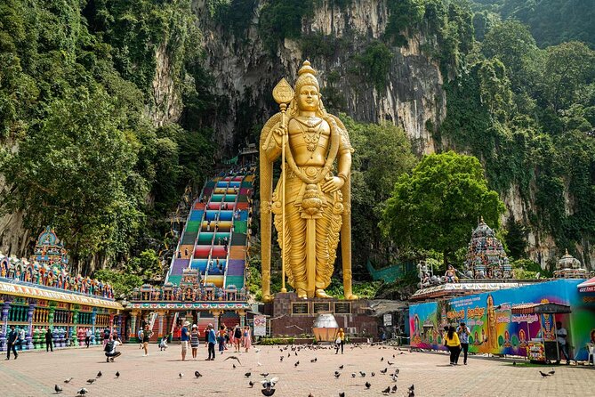 Private FullDay Tour includes Petronas Twin Towers & Batu Caves - Batu Caves: A 100-Year-Old Cave Temple With Idols and Statues