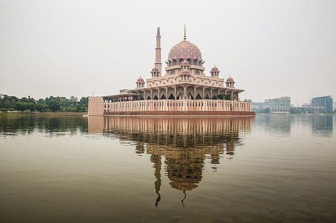 Putrajaya Tour From Kuala Lumpur Includes Batu Caves - Batu Caves: the 140-foot Murugan statue and 45 minutes in the caves