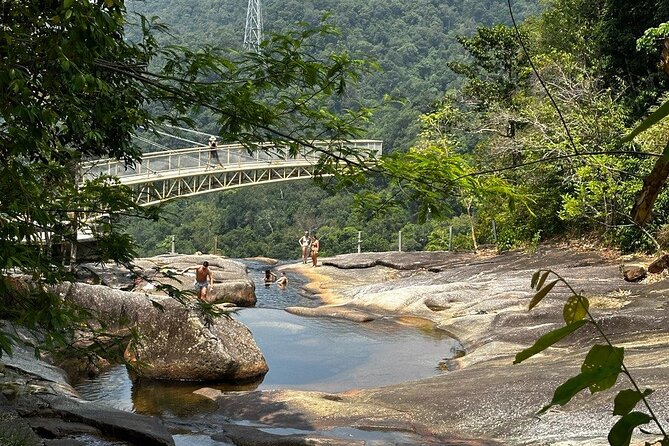 Telaga Tujuh Waterfall Half Day and Sacred Blue Pool Tour - Drinks and Small Comfort Wins Along the Route